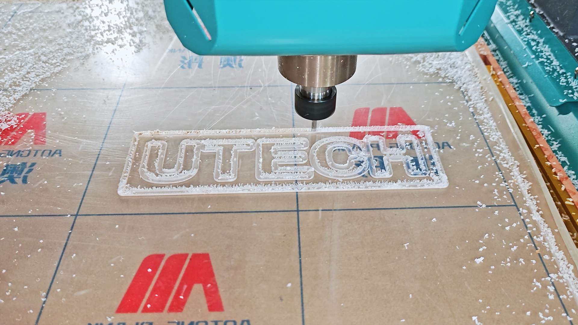 CNC router machine cutting acrylic