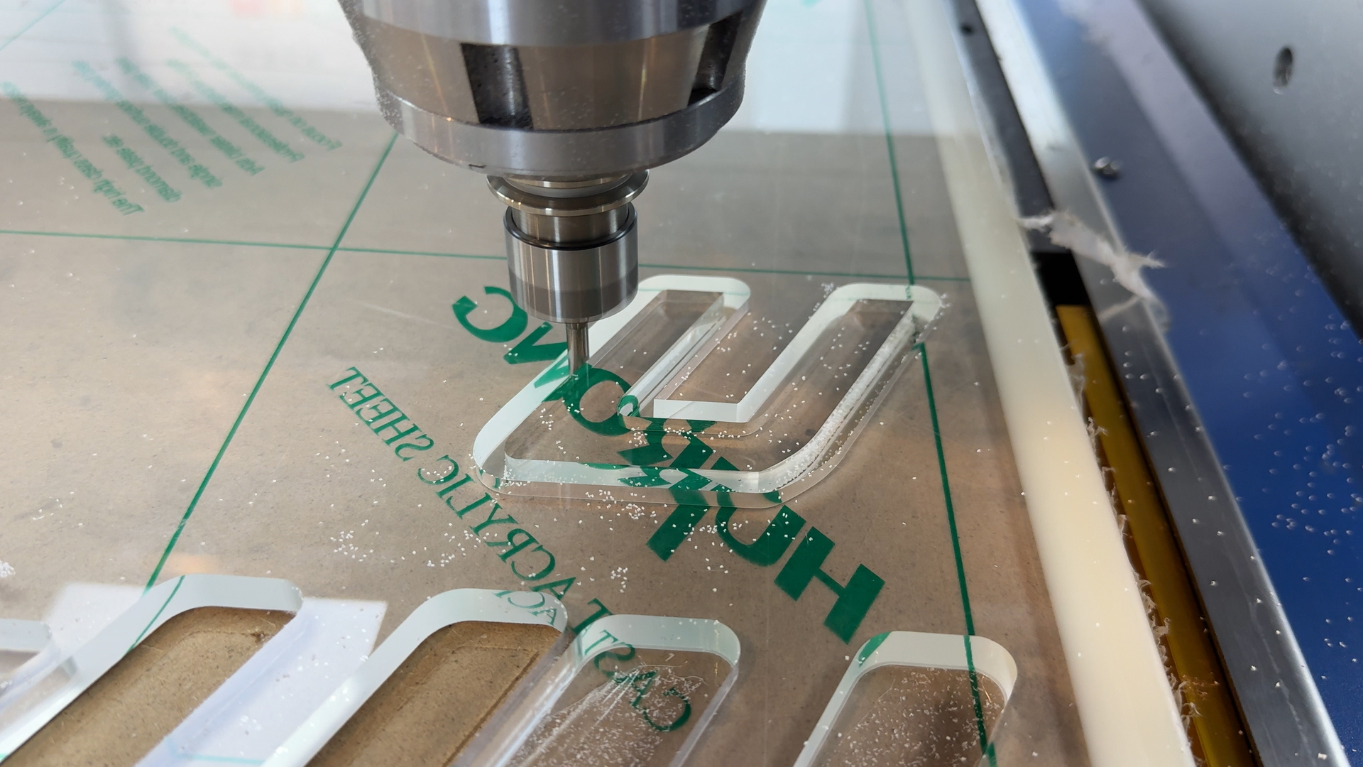 CNC router machine cutting acrylic